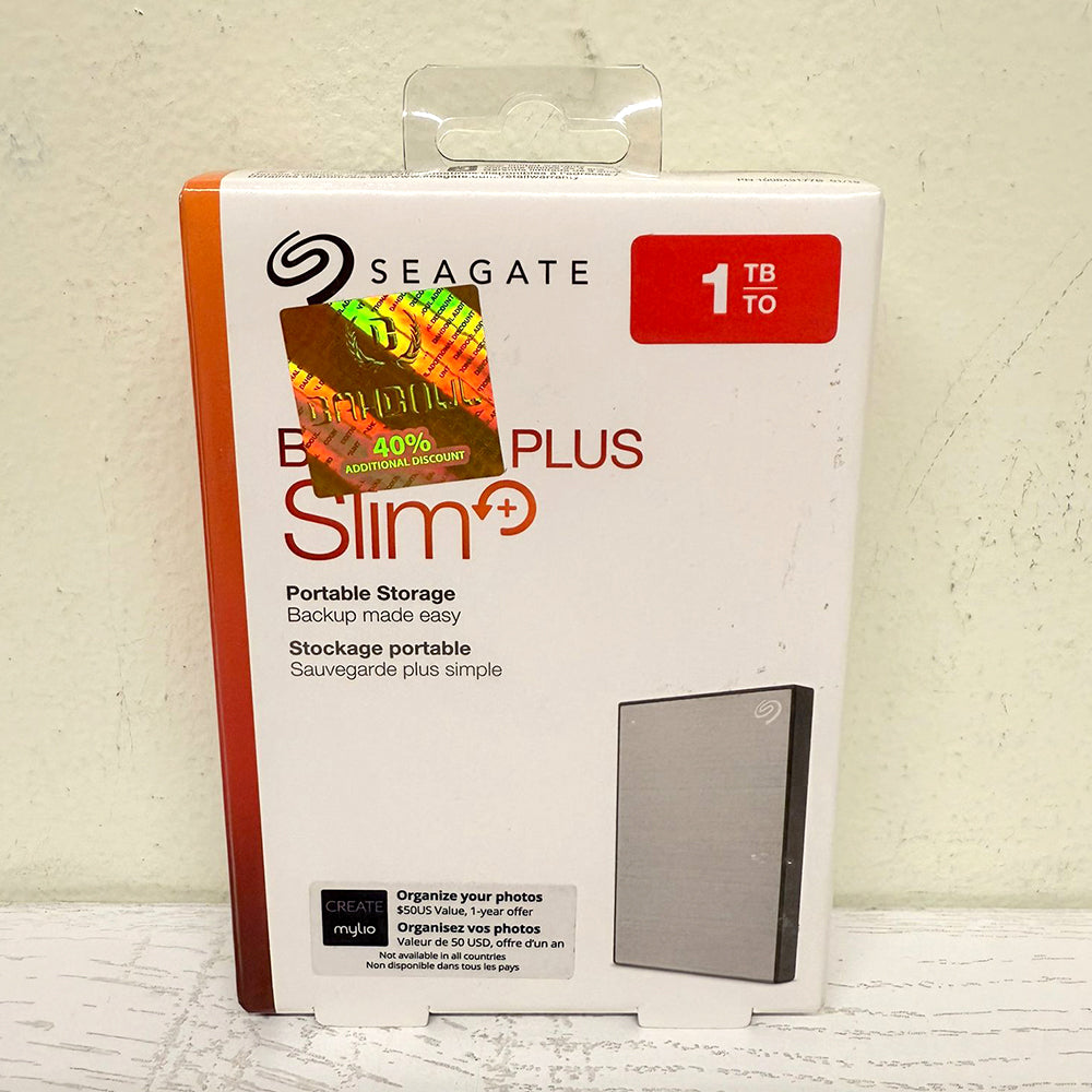 Seagate Backup Plus Slim 1TB Portable External Hard Drive – USB 3.0, Silver – Brand New