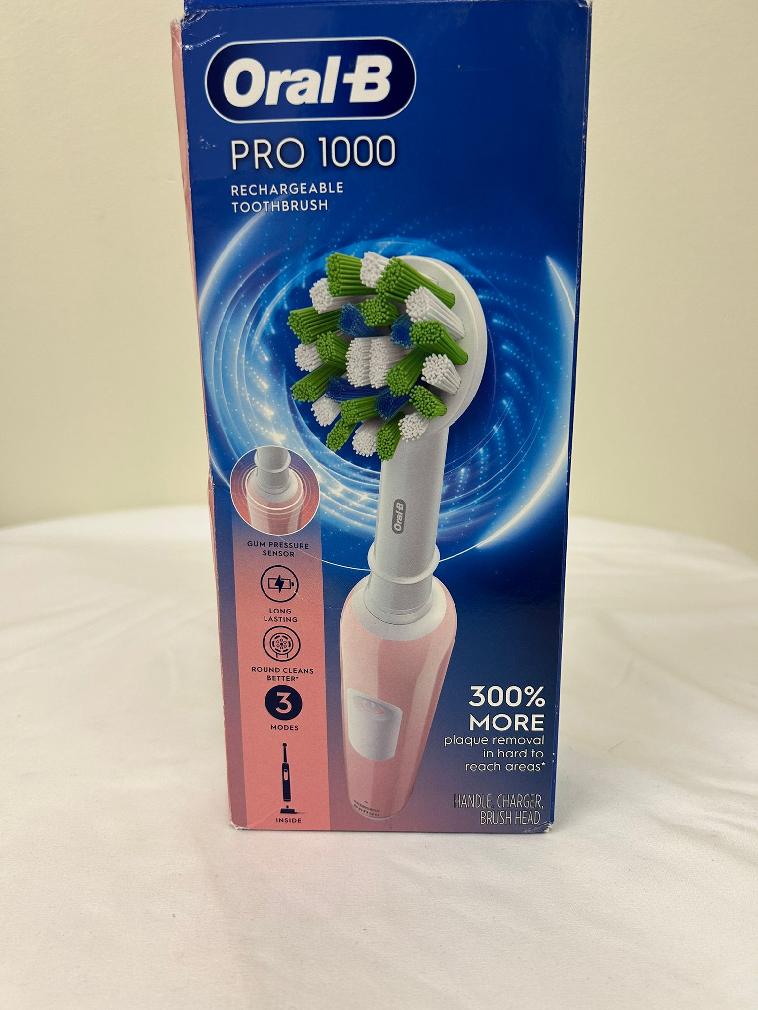 Oral-B Pro 1000 Rechargeable Electric Toothbrush (Pink)