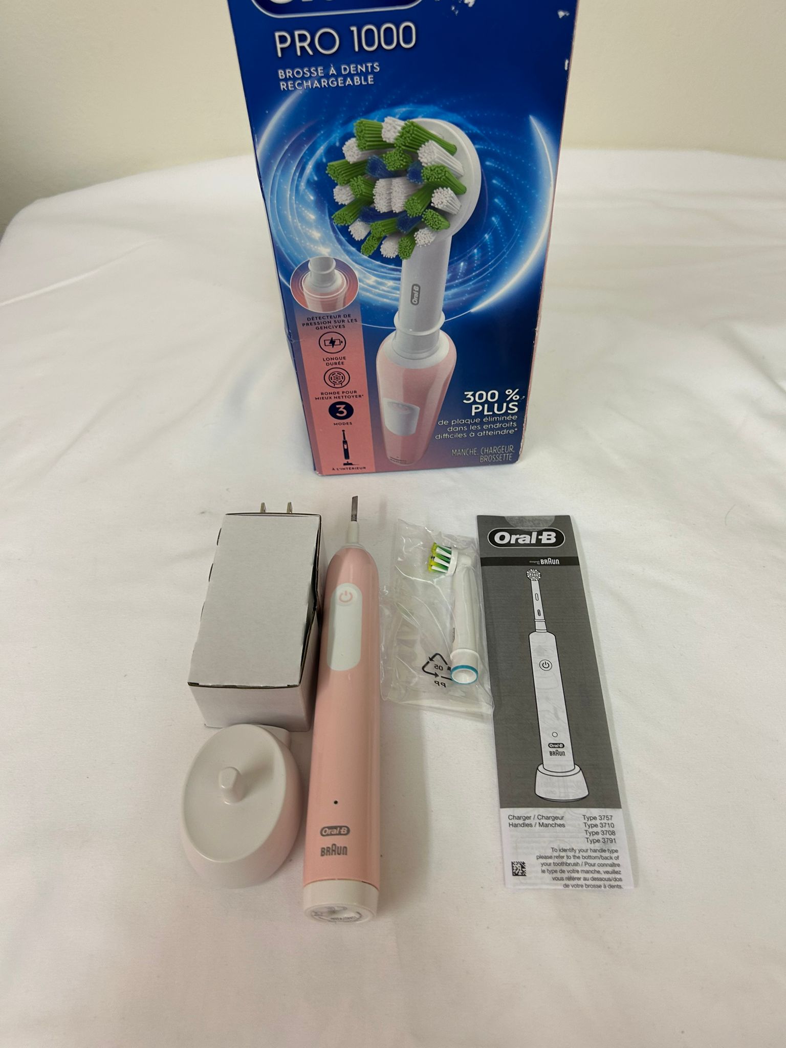 Oral-B Pro 1000 Rechargeable Electric Toothbrush (Pink)