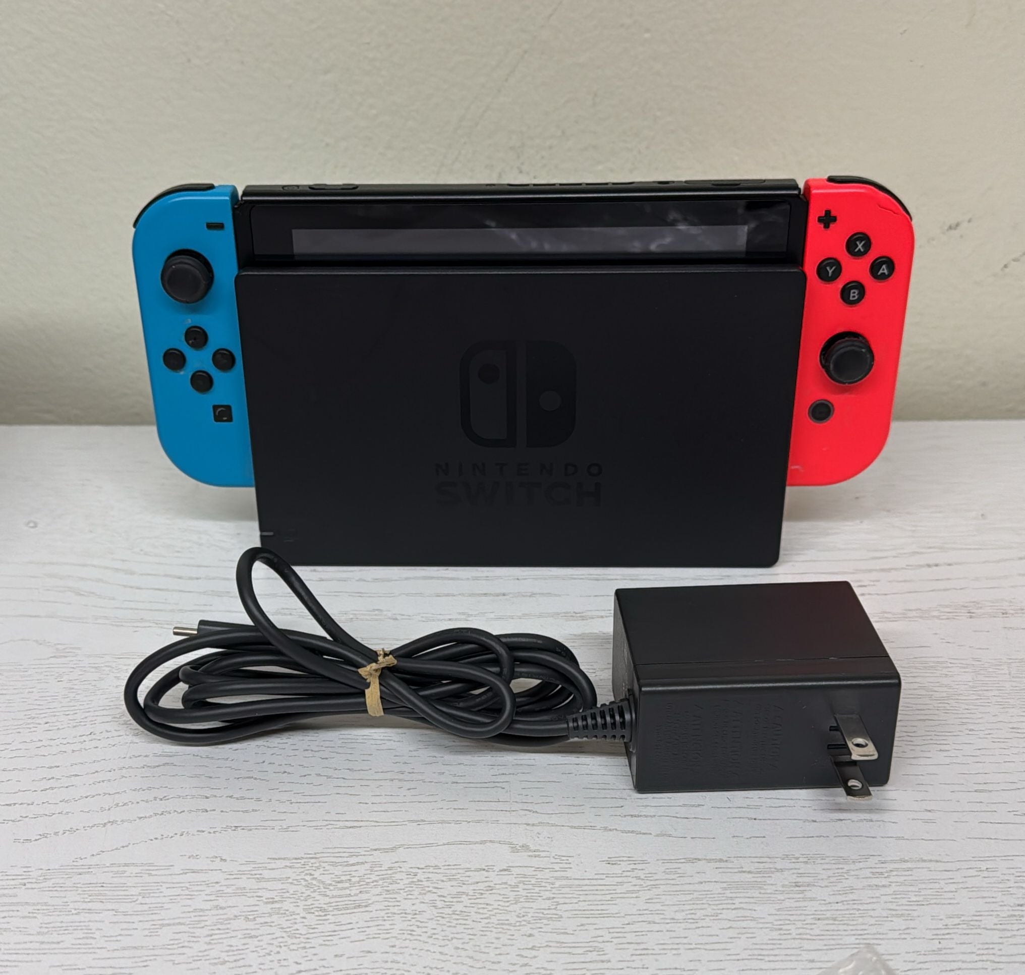 Nintendo Switch with Neon Blue and Neon Red Joy‑Con